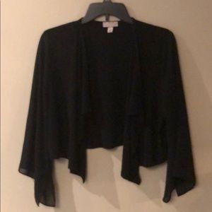 Black shrug